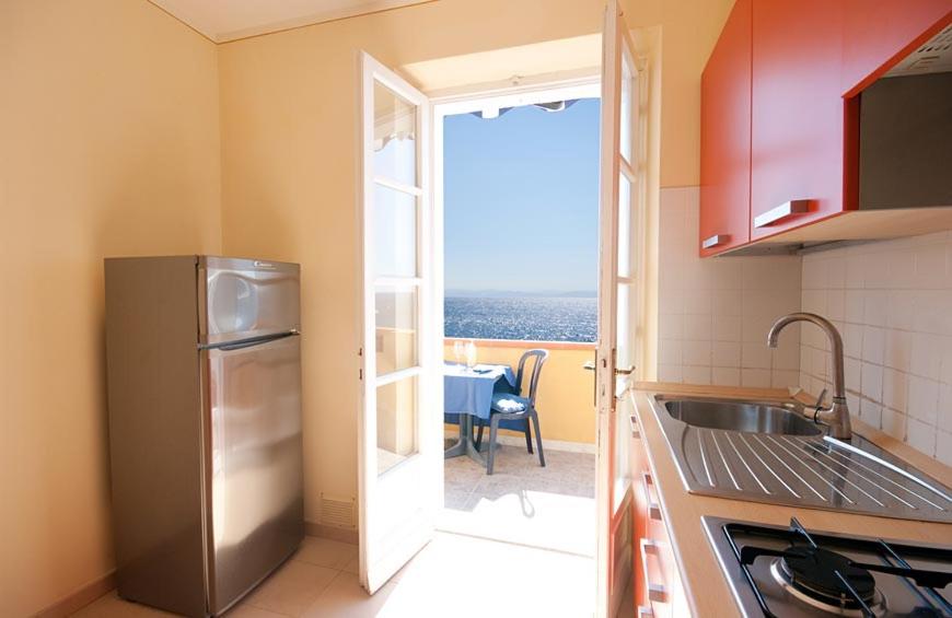 Kuchyň nebo kuchyňský kout v ubytování Appartamenti - Villa Mare