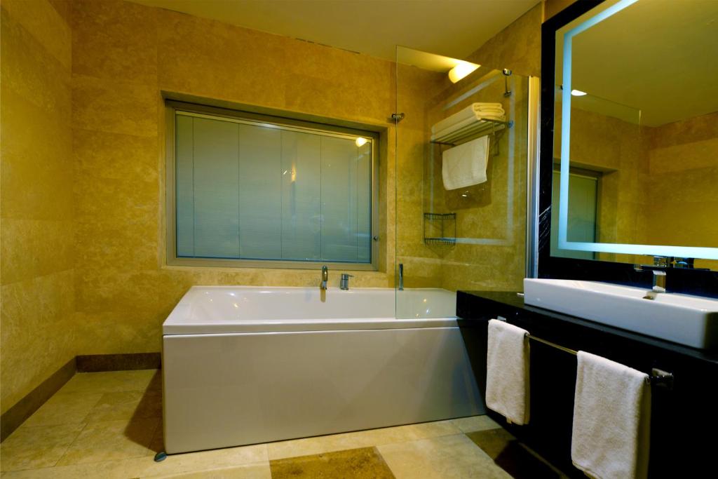 Koupelna v ubytování Margi Hotel