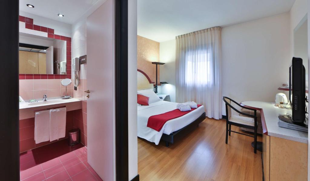 Postel nebo postele na pokoji v ubytování Best Western Hotel Solaf