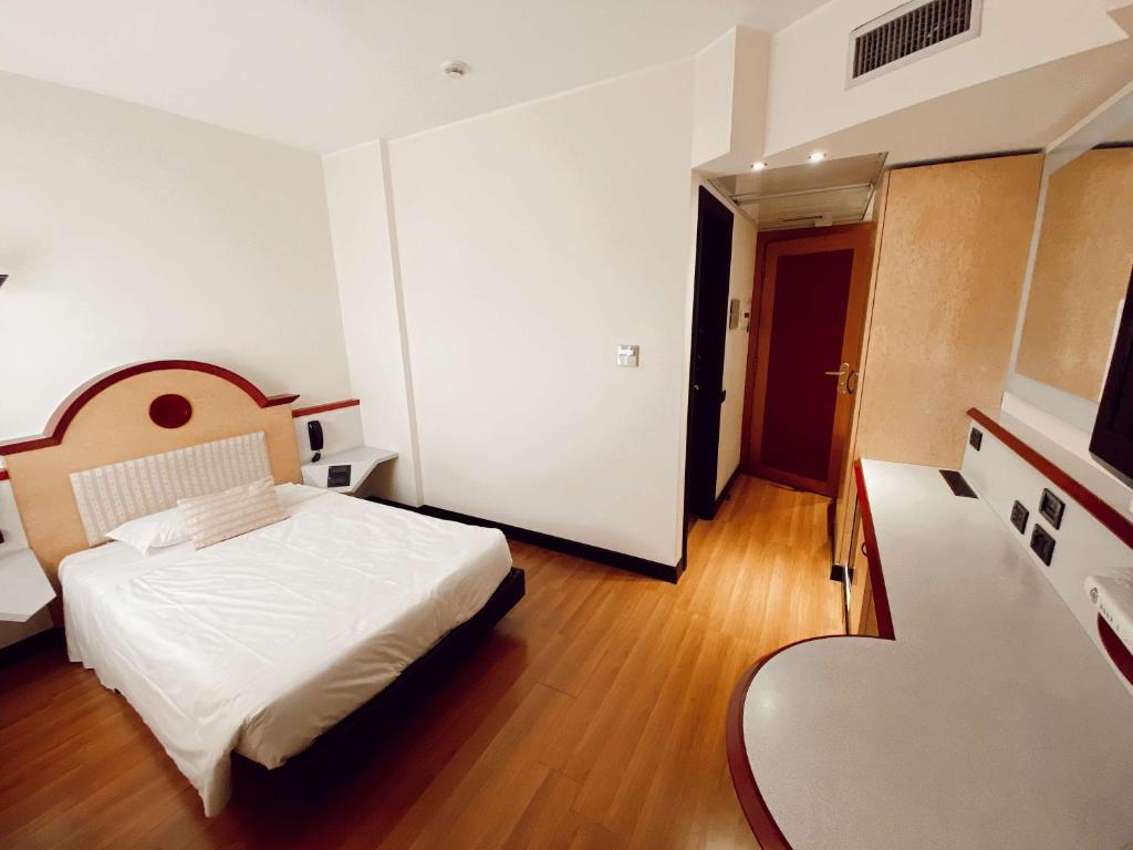Postel nebo postele na pokoji v ubytování Best Western Hotel Solaf