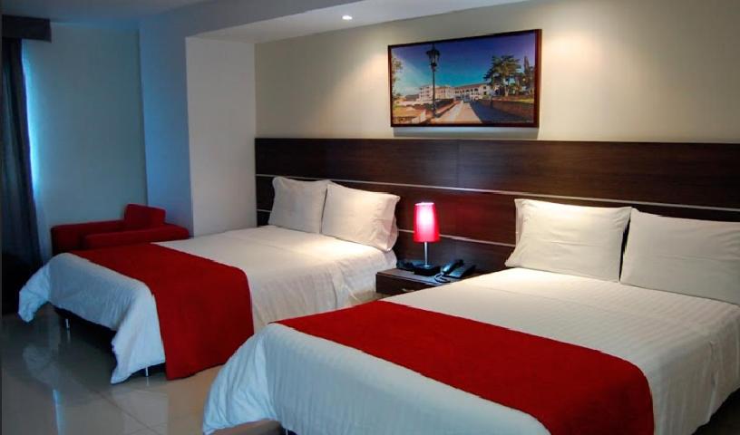 Cama o camas de una habitación en Hotel San Martin Popayan