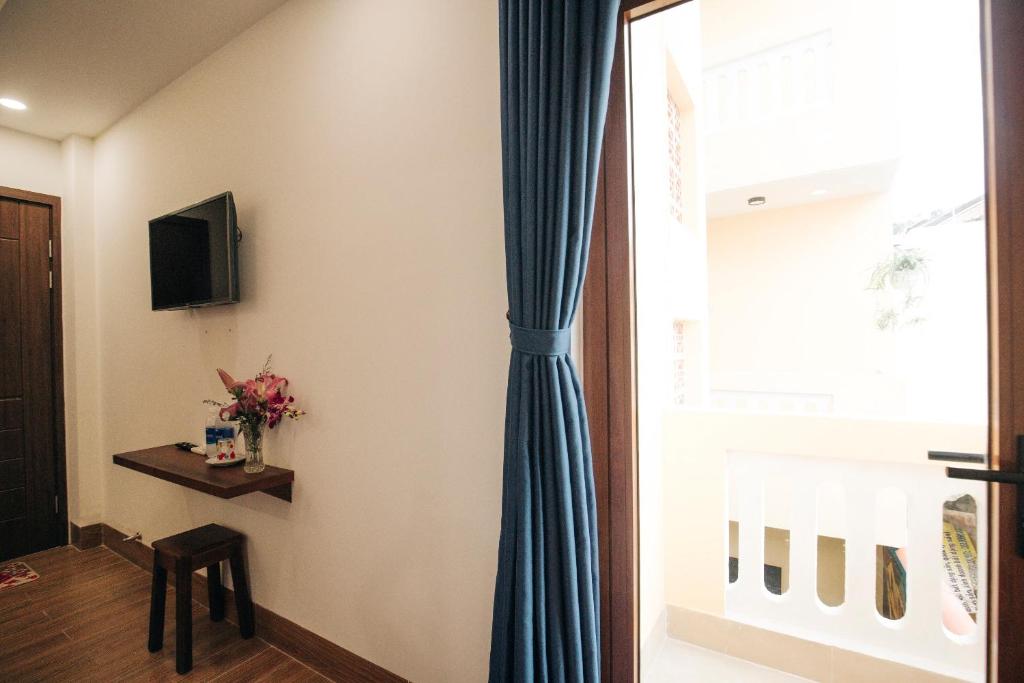 TV a/nebo společenská místnost v ubytování THE VIEW HOMESTAY HỘI AN