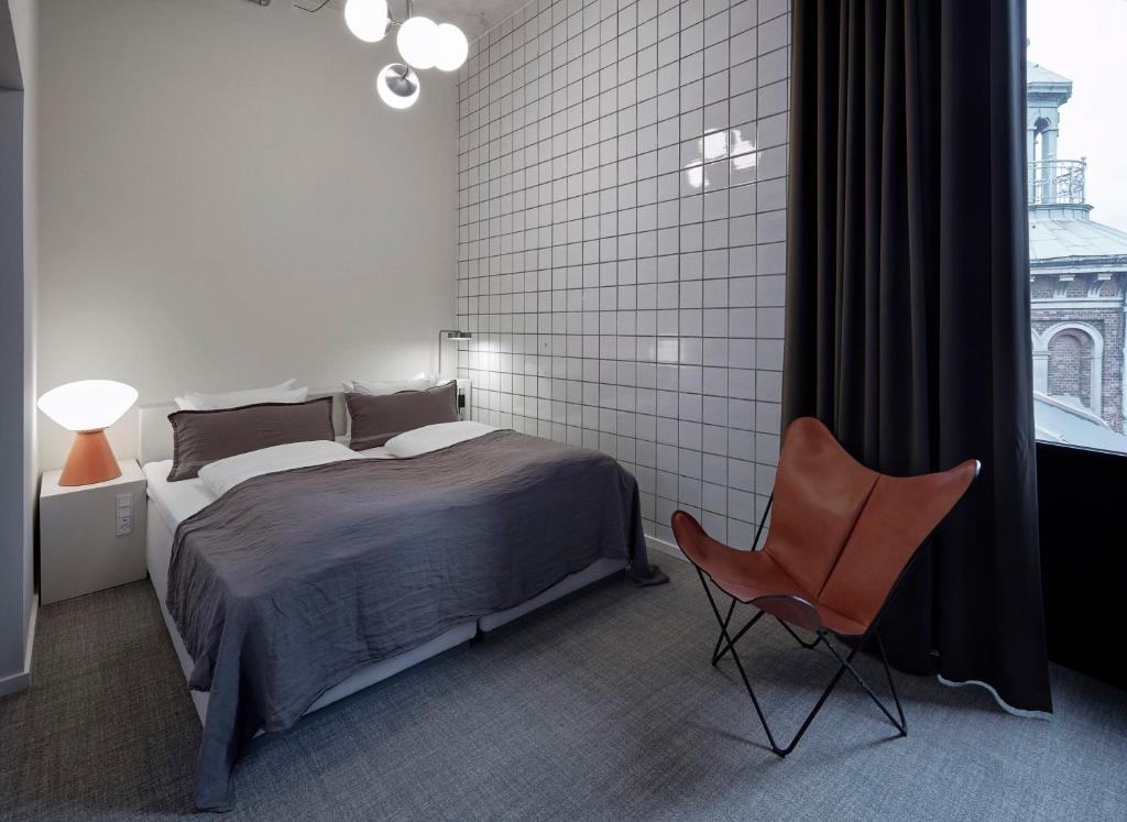 Postel nebo postele na pokoji v ubytování Hotel Ottilia