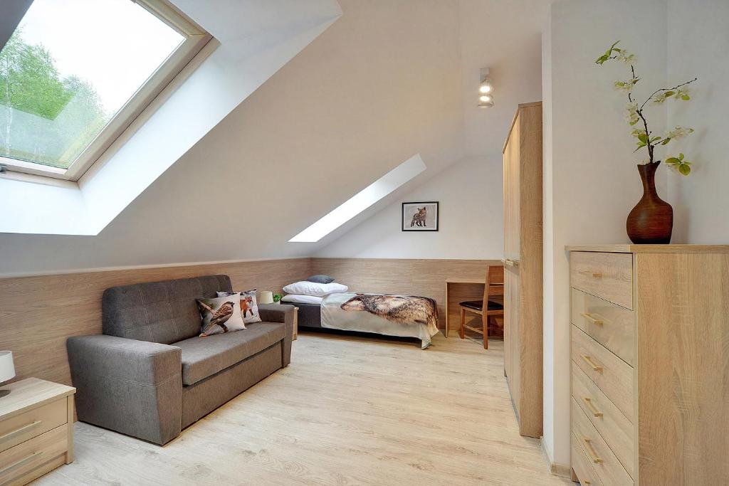 Posezení v ubytování Ekskluzywne Apartamenty Sun Seasons 24 w Karpaczu by Noclegi Renters