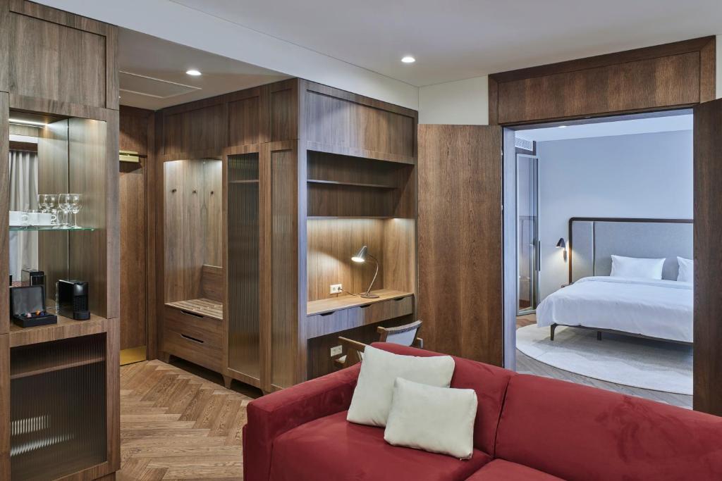 Postel nebo postele na pokoji v ubytování Neringa Hotel