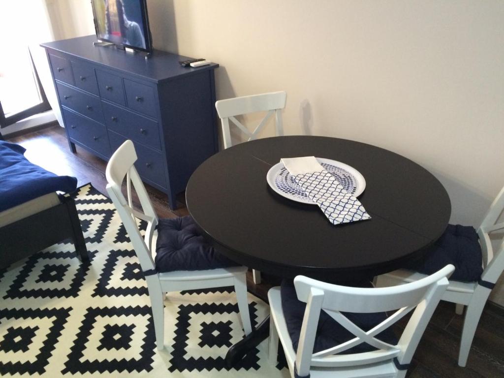 A seating area at Apartment Perfect