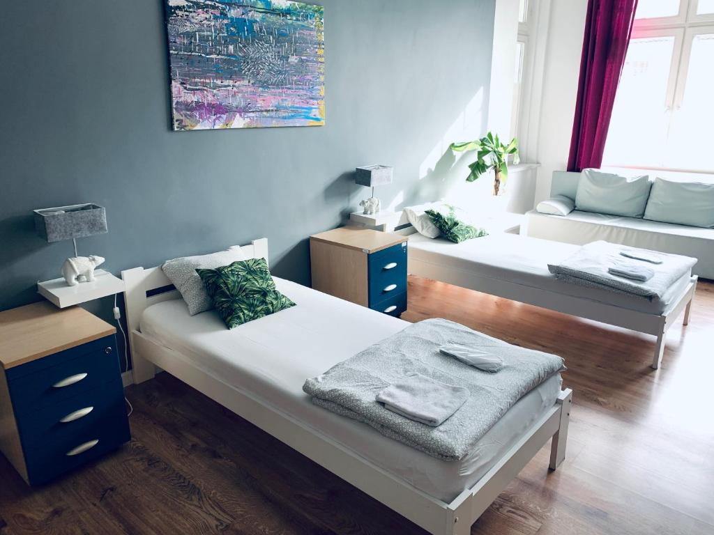 Posteľ alebo postele v izbe v ubytovaní Chilli Hostel