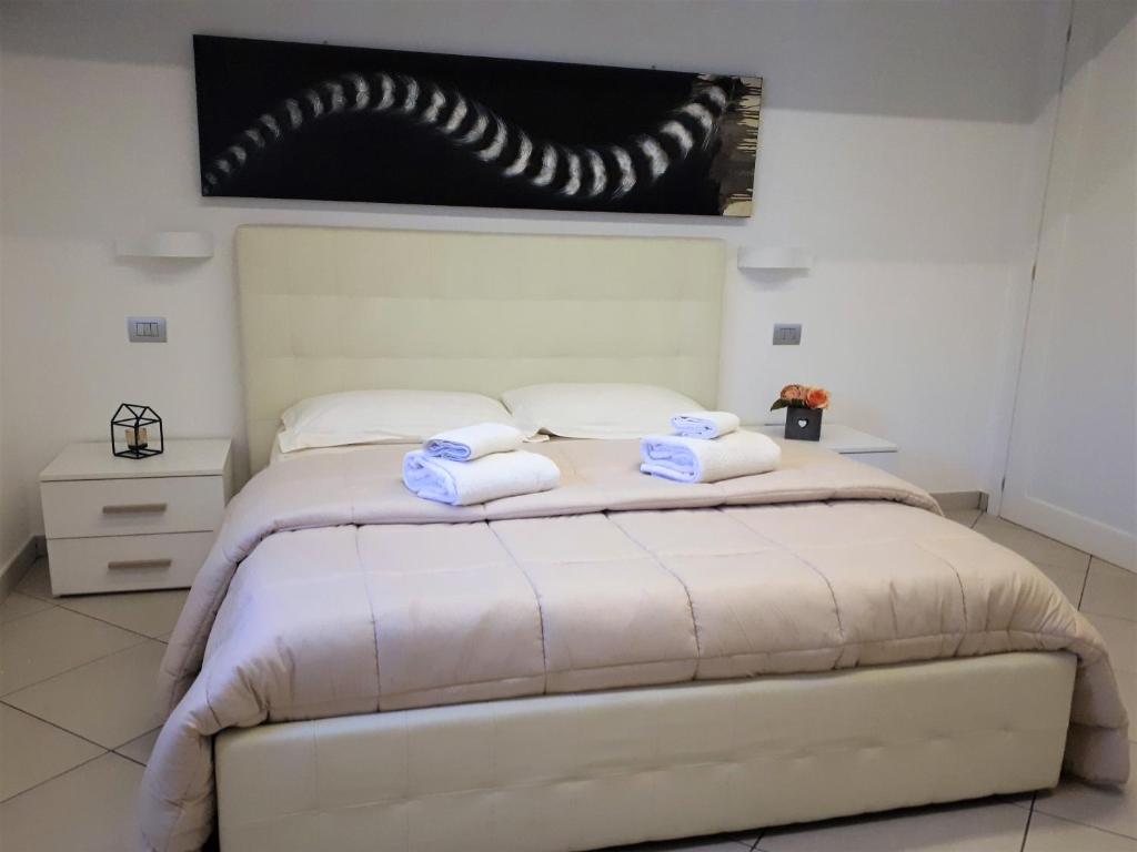 Postel nebo postele na pokoji v ubytování Villa Treglia b&b