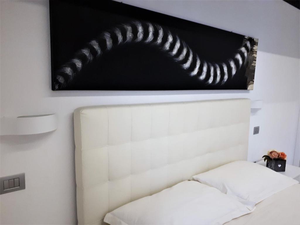 Postel nebo postele na pokoji v ubytování Villa Treglia b&b