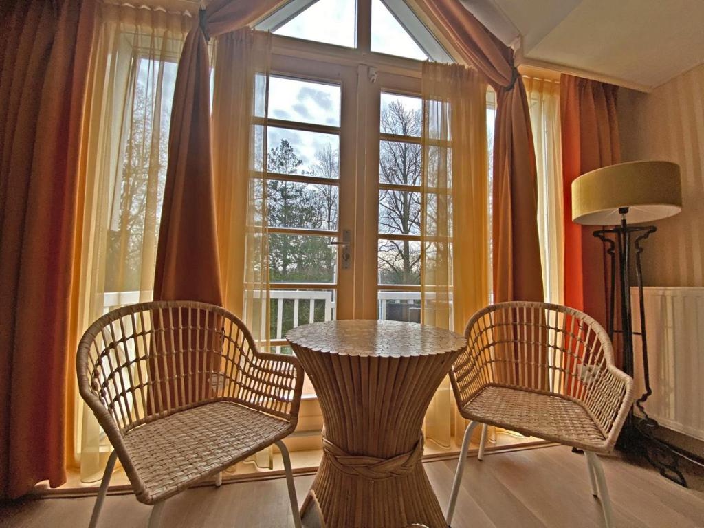 Posezení v ubytování Villa Prinsenhof # Vierentwintig