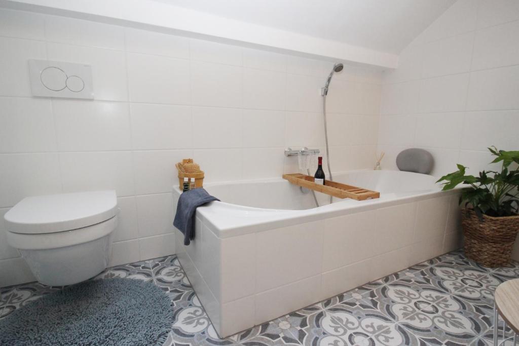 Koupelna v ubytování B&B Le Jardin