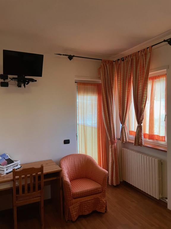 TV a/nebo společenská místnost v ubytování Hotel Culmine