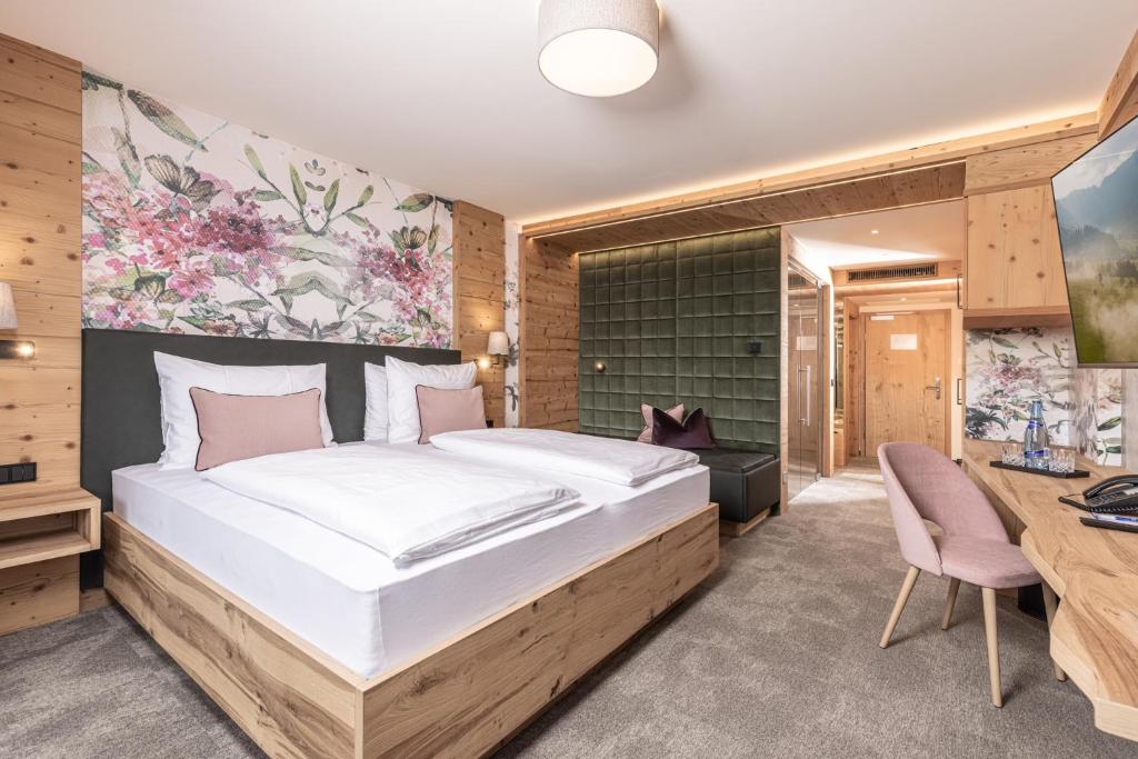 Postel nebo postele na pokoji v ubytování 4*S Galtenberg Resort