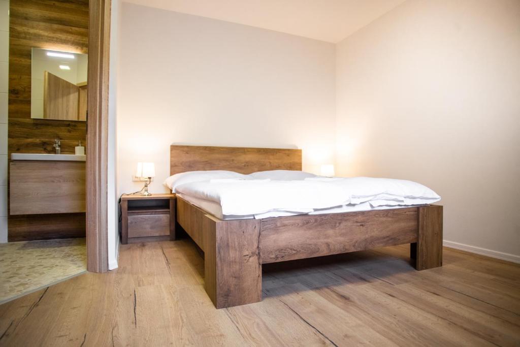 Postel nebo postele na pokoji v ubytování Penzion a Restaurace v Zátiší