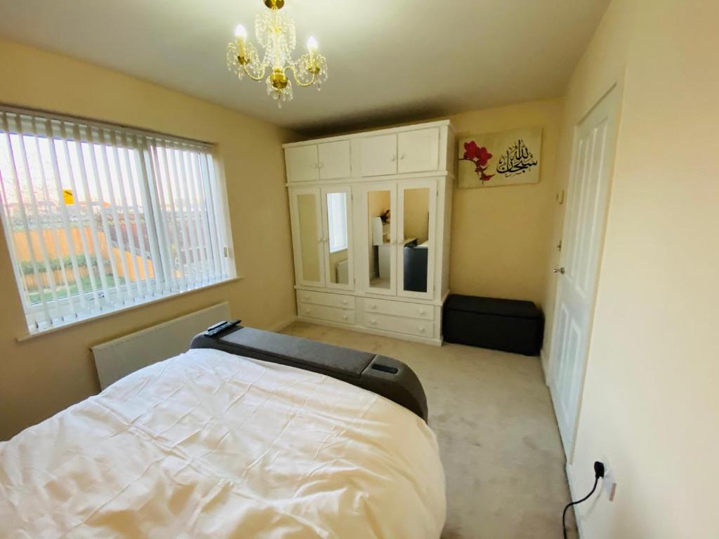 Postel nebo postele na pokoji v ubytování Birmingham Guesthouse