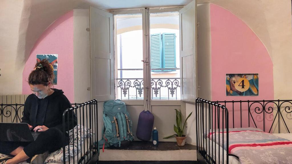 Postel nebo postele na pokoji v ubytování Hostel Il Nosadillo - Bologna