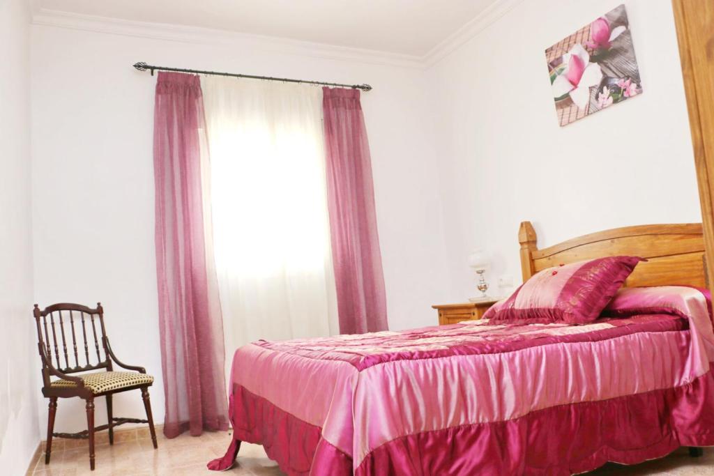 Posteľ alebo postele v izbe v ubytovaní Apartamento Cervantes Conil