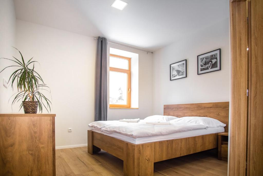 Postel nebo postele na pokoji v ubytování Penzion a Restaurace v Zátiší