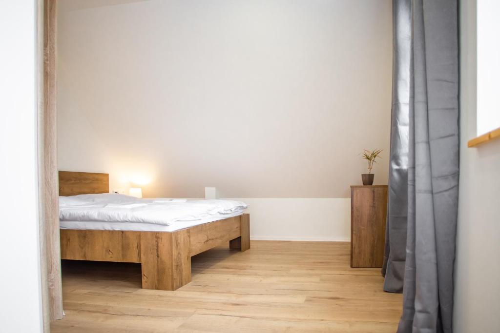 Postel nebo postele na pokoji v ubytování Penzion a Restaurace v Zátiší