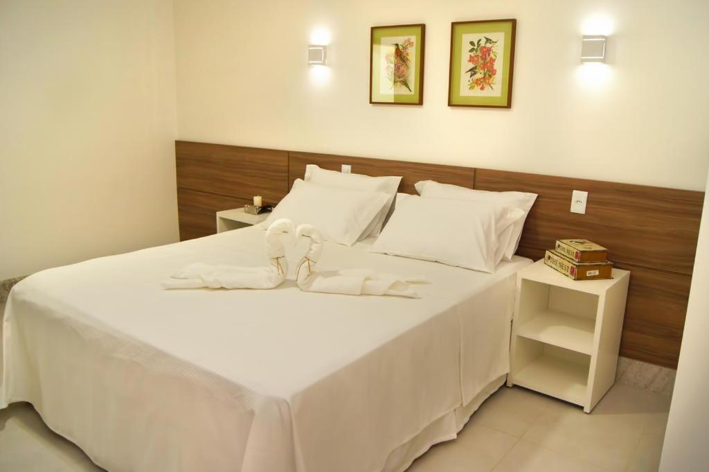 Postel nebo postele na pokoji v ubytování Hotel Flor Da Chapada