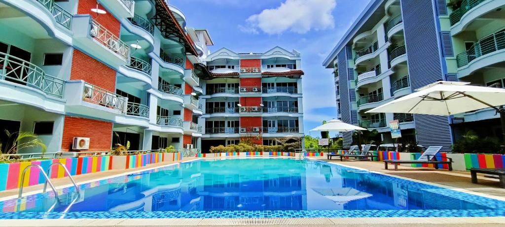 Poolen vid eller i närheten av Perdana Serviced Apartment & Resorts