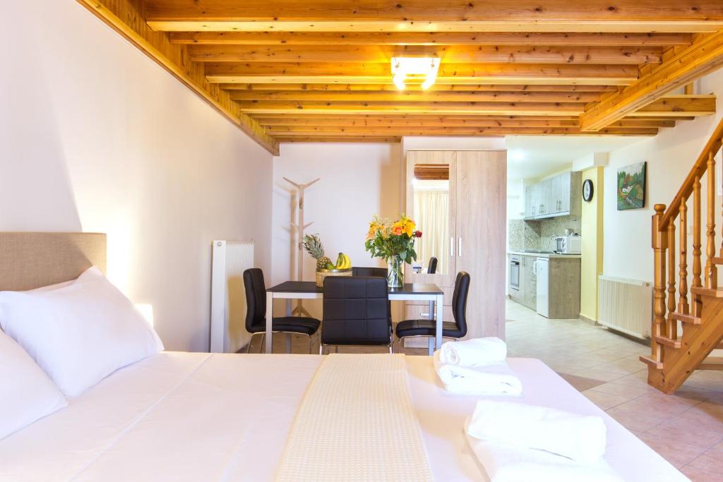 A bed or beds in a room at Rooms Kavala