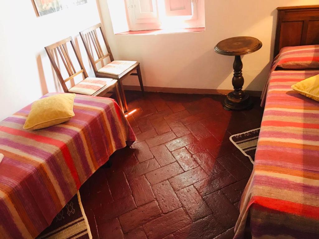 A bed or beds in a room at Nel Colle