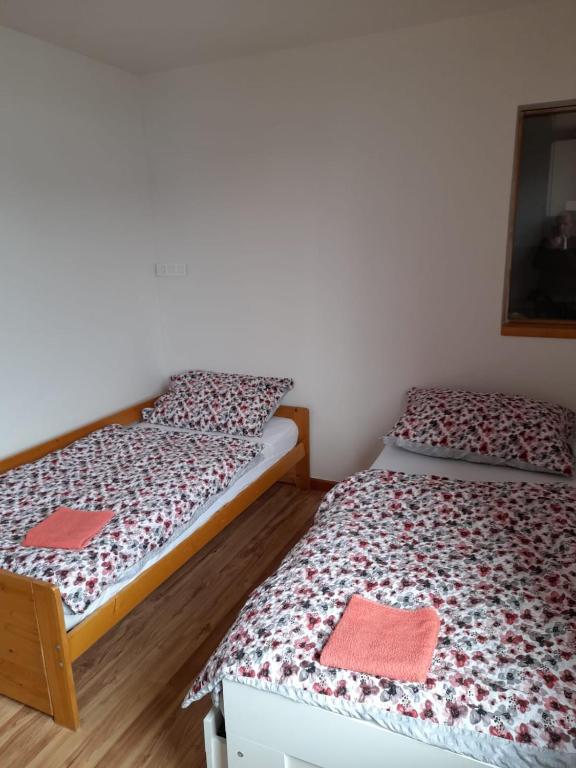 Postel nebo postele na pokoji v ubytování Riegrova