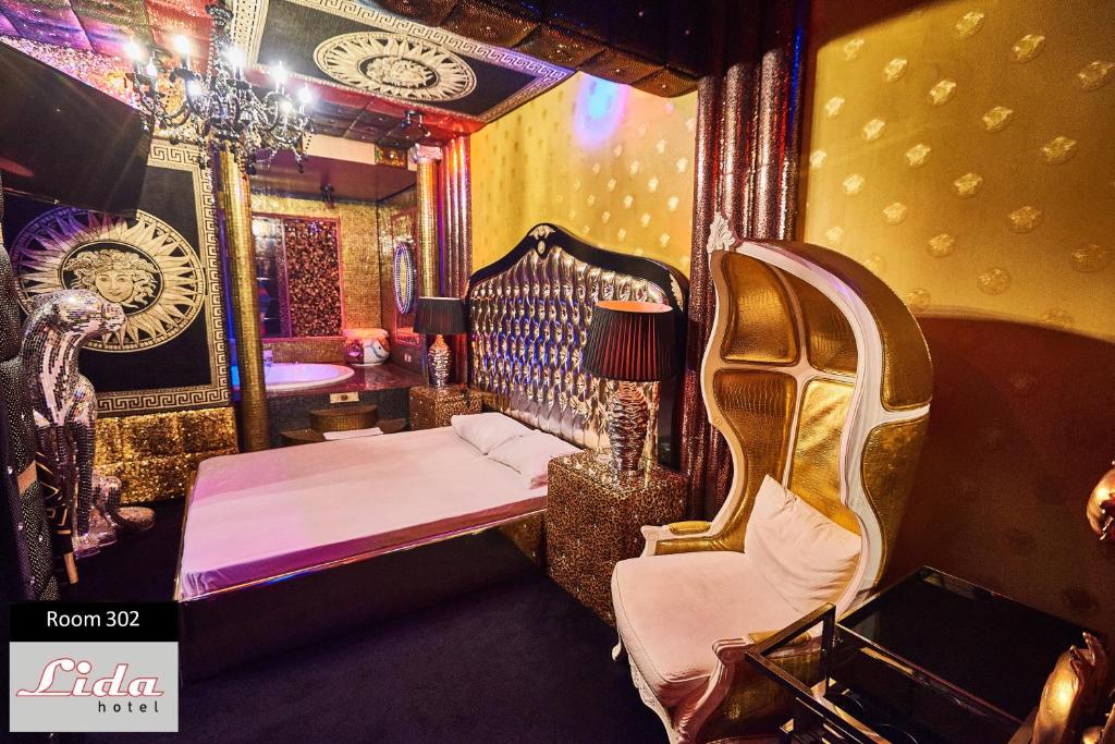 Postel nebo postele na pokoji v ubytování Lida Hotel