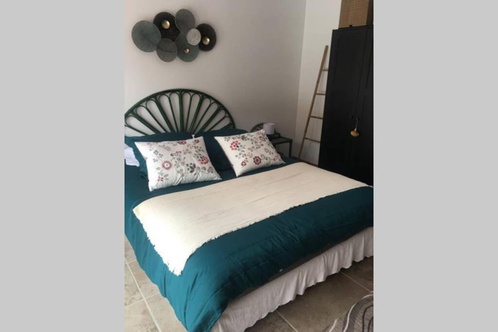 Postel nebo postele na pokoji v ubytování maisonette Cosi