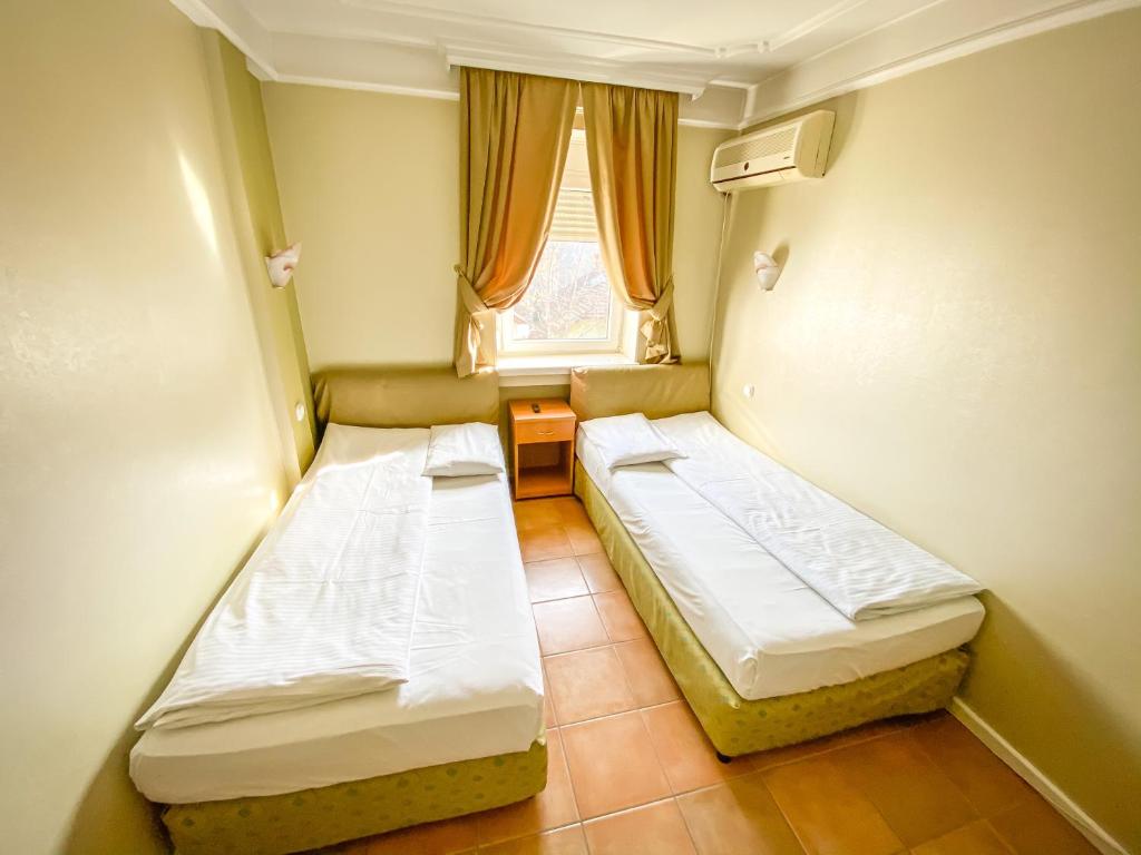 Postel nebo postele na pokoji v ubytování Sobe Rimski