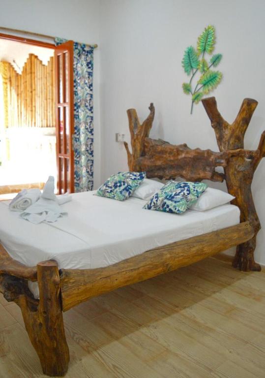 Ліжко або ліжка в номері Eco Hostal Kuima