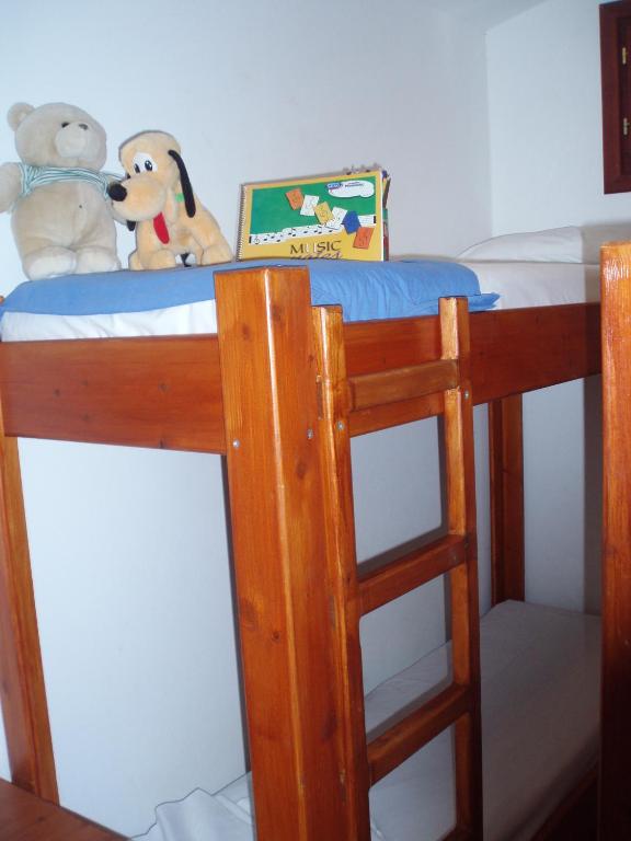 Postel nebo postele na pokoji v ubytování Bungalow - Camping Apollon