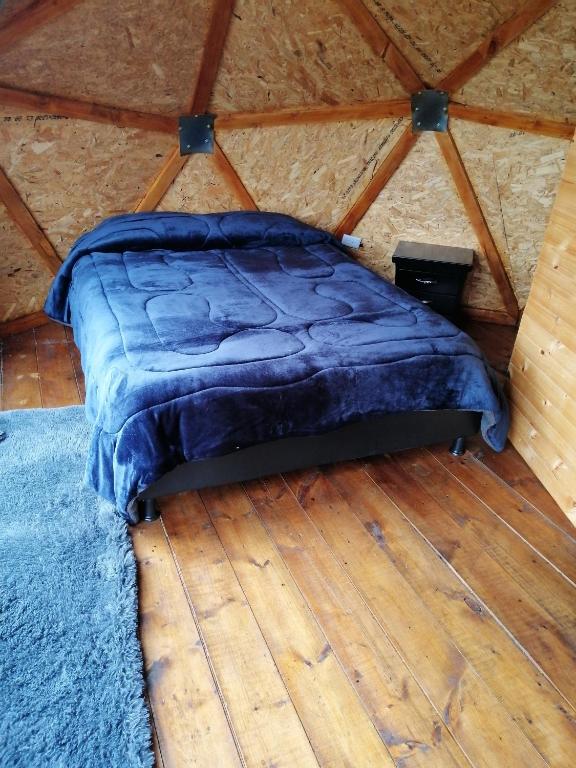 Letto o letti in una camera di Cabañas el mirador del tomine