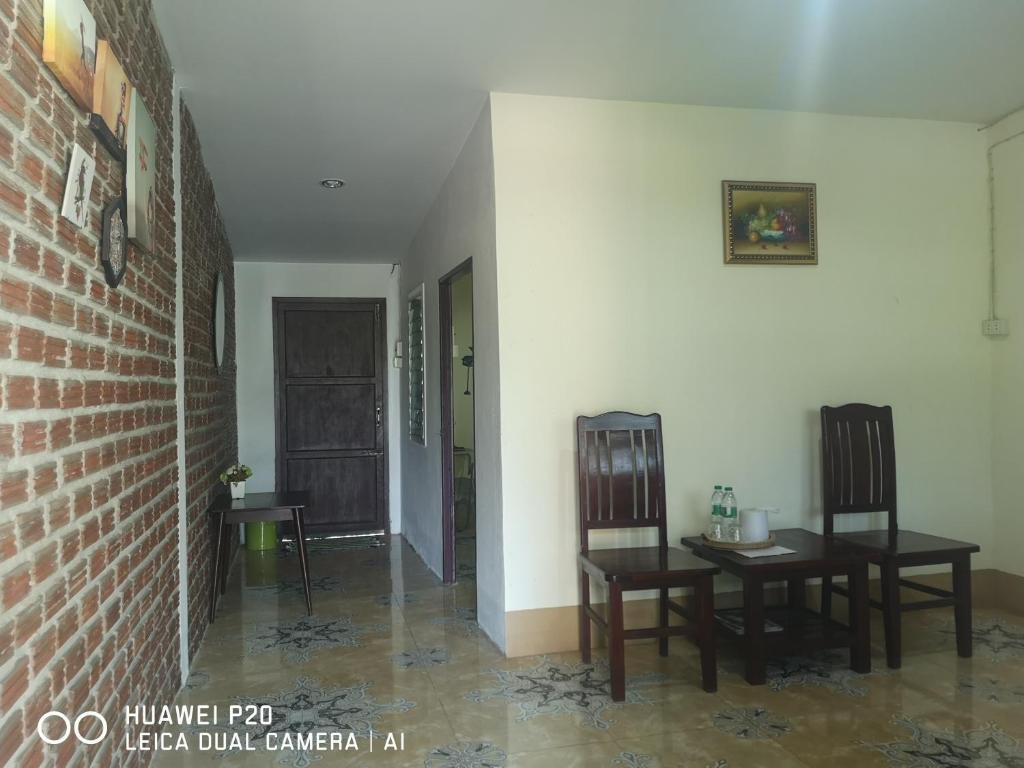 Posezení v ubytování บ้านในสวนรีสอร์ทBannnaisuan Resort