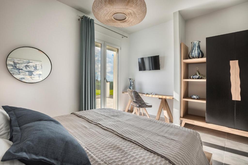 Posteľ alebo postele v izbe v ubytovaní Artemon New Luxury Villa