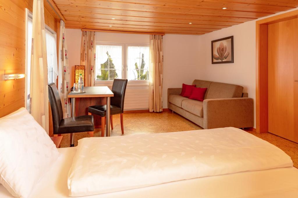 Postel nebo postele na pokoji v ubytování Hotel Frohe Aussicht