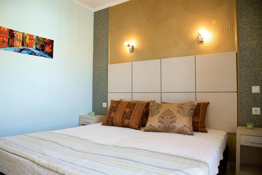 Postel nebo postele na pokoji v ubytování Kaplanis House