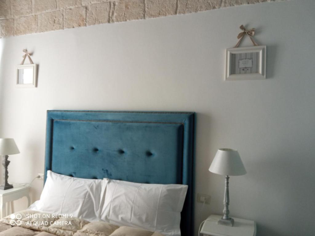Posteľ alebo postele v izbe v ubytovaní B&B La Porta Vecchia