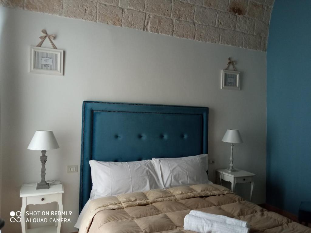 Posteľ alebo postele v izbe v ubytovaní B&B La Porta Vecchia