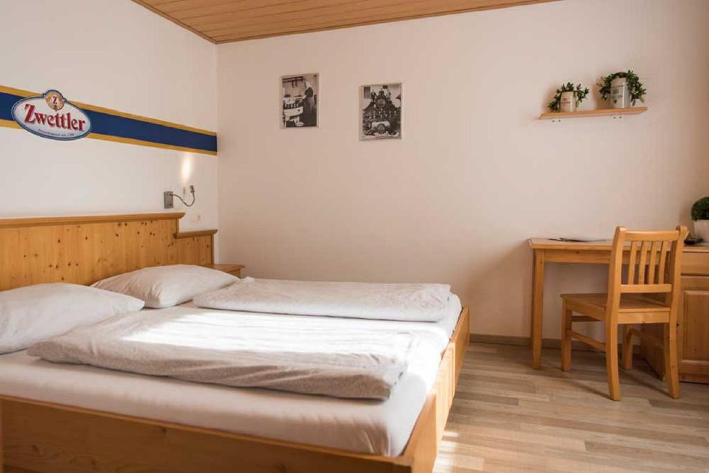 Postel nebo postele na pokoji v ubytování Gasthof Schindler