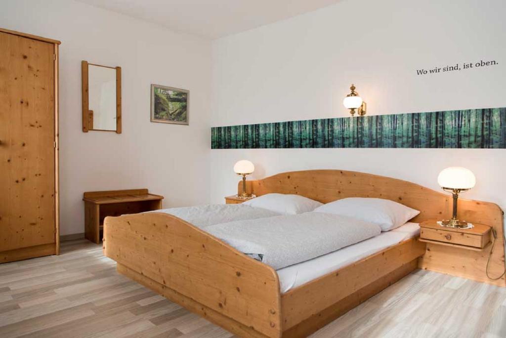 Postel nebo postele na pokoji v ubytování Gasthof Schindler