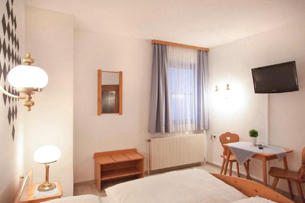Postel nebo postele na pokoji v ubytování Gasthof Schindler