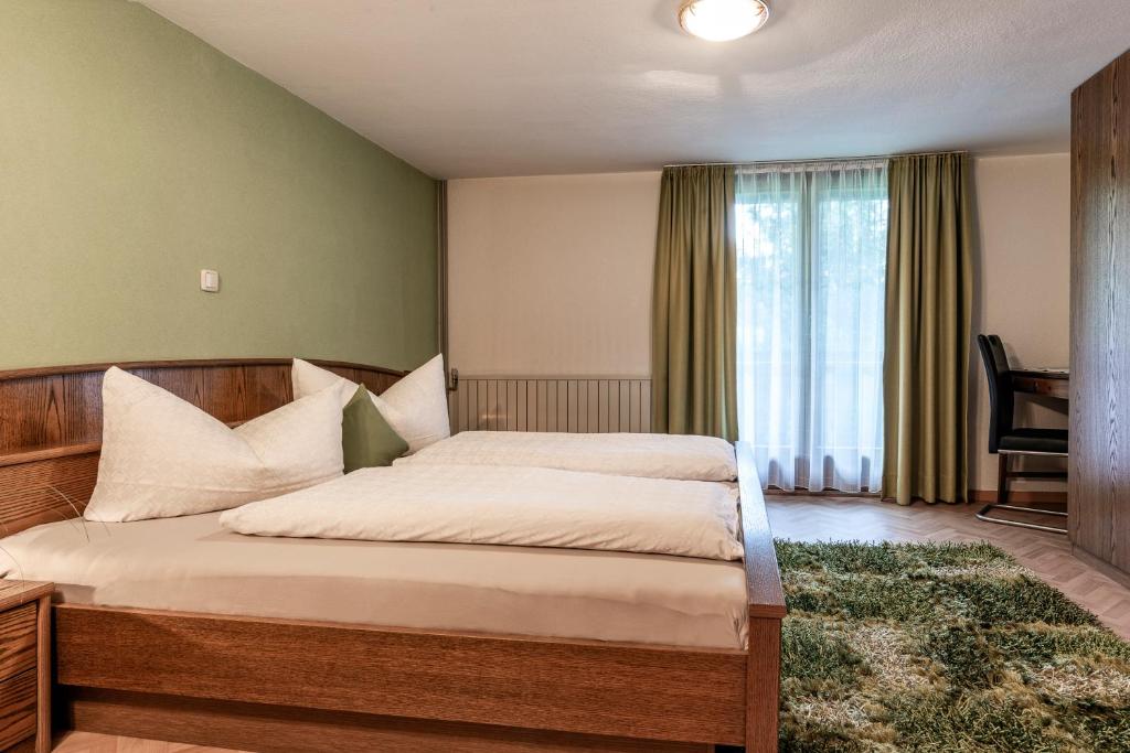 Postel nebo postele na pokoji v ubytování Vroni Höcher