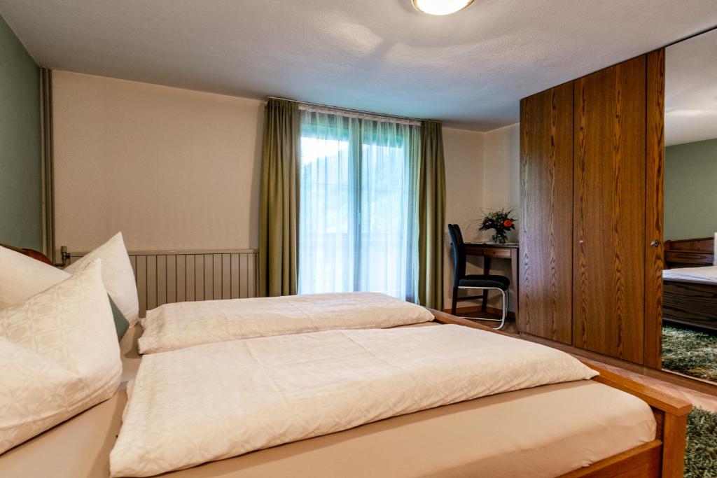 Postel nebo postele na pokoji v ubytování Vroni Höcher