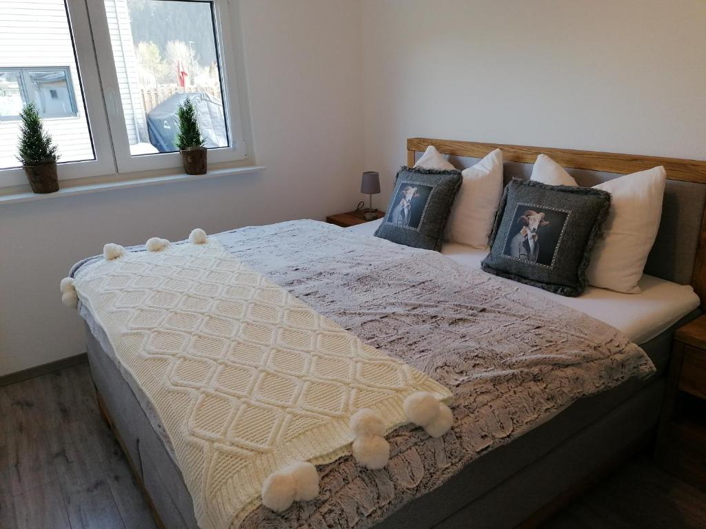 Postel nebo postele na pokoji v ubytování Appartements Bergliebe