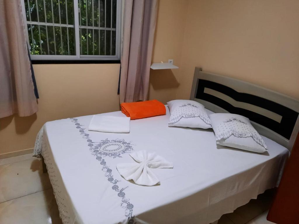 Ένα ή περισσότερα κρεβάτια σε δωμάτιο στο Casa Neto&Lu