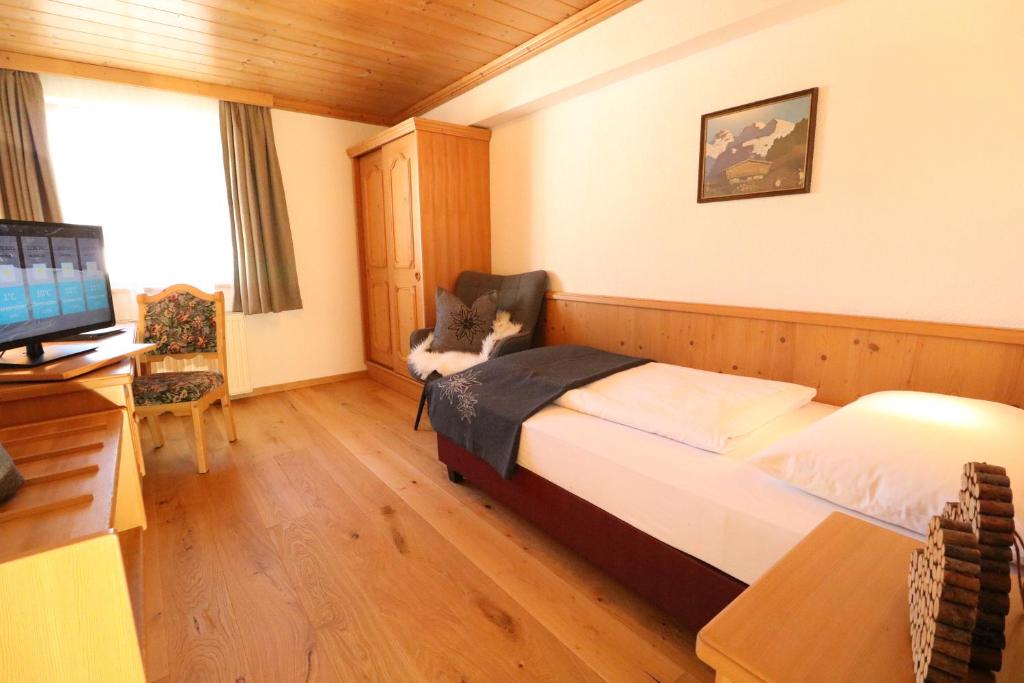 Postel nebo postele na pokoji v ubytování Hotel Bräu