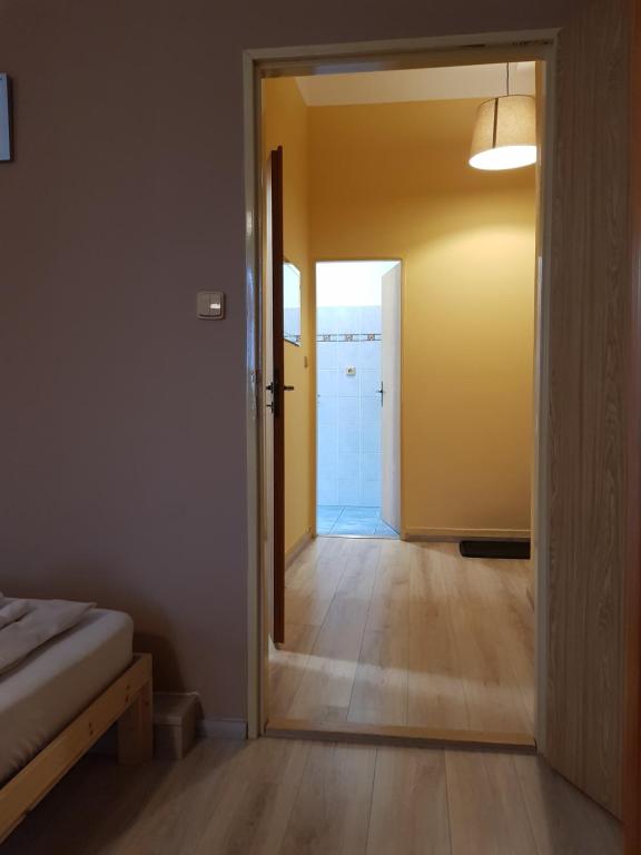 Łóżko lub łóżka w pokoju w obiekcie Pension Elektra