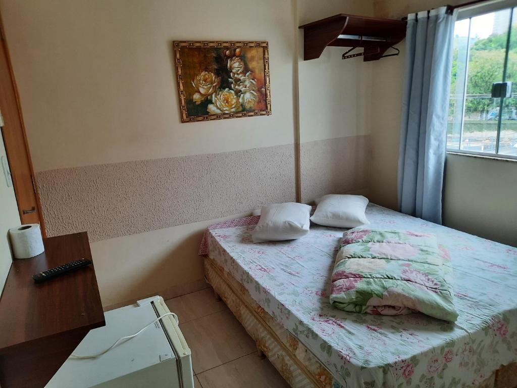 Voodi või voodid majutusasutuse Pousada Mãe Ternura Palace toas